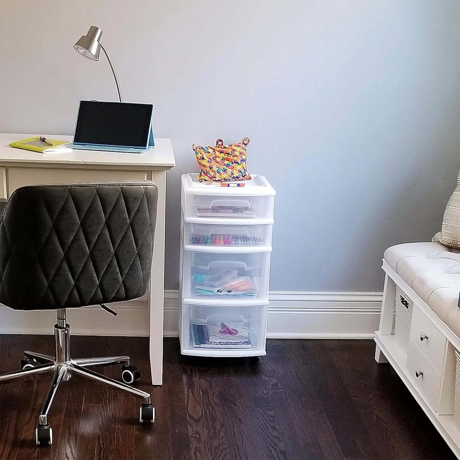 A HOMZ white drawer tower on wheels beside a desk